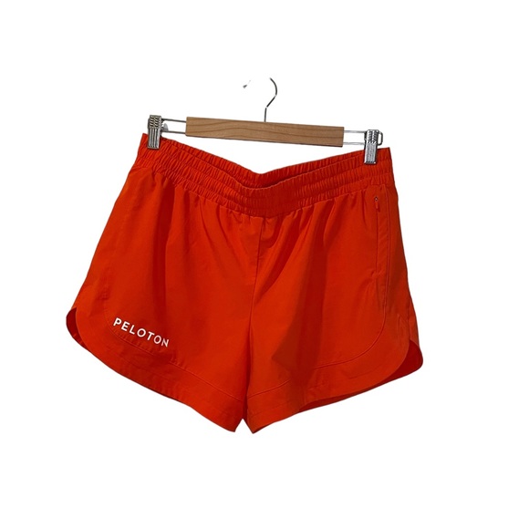 Peloton Pants - Peloton women’s tulip run shorts in orange size M